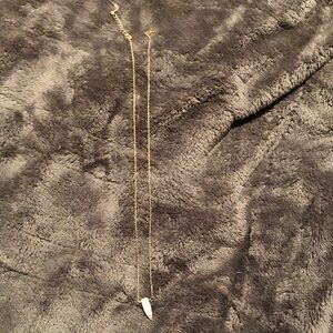 Elegant Gold Necklace with White Stone Pendant